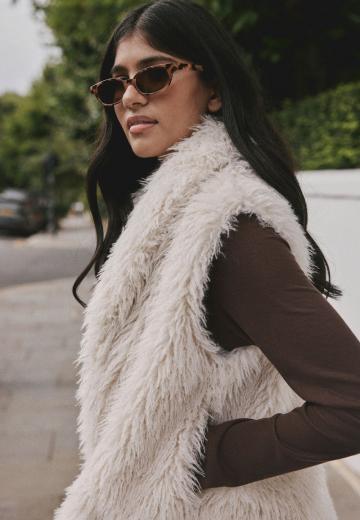 Пуховой жилет