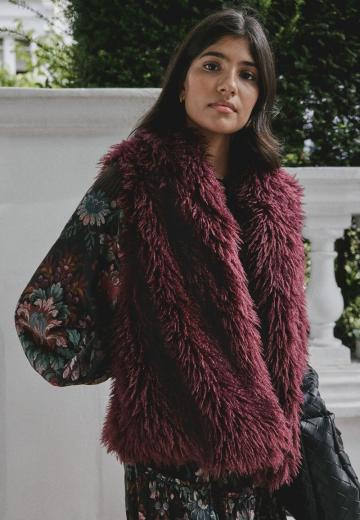 Пуховой жилет