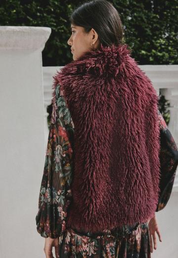 Пуховой жилет