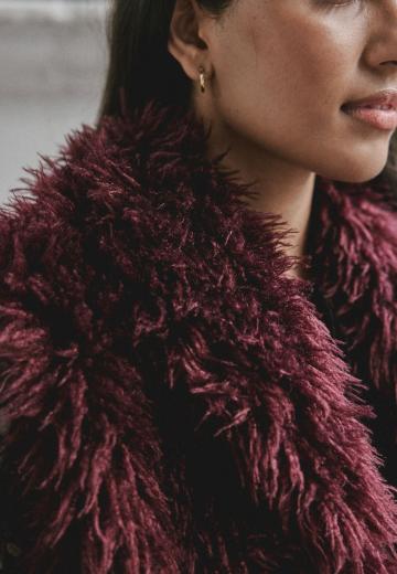 Пуховой жилет