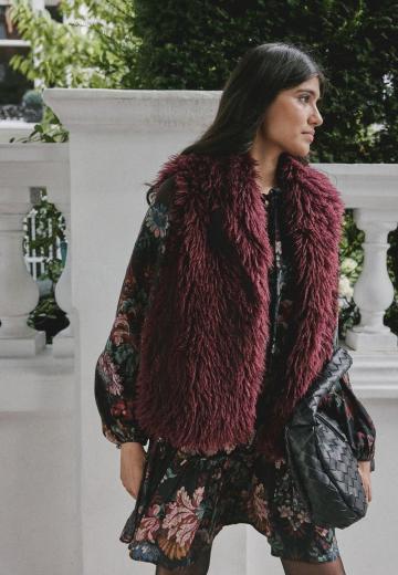 Пуховой жилет