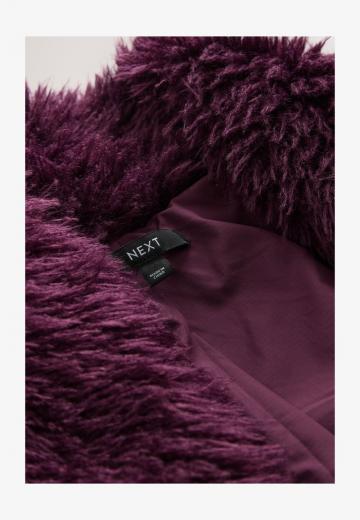 Пуховой жилет