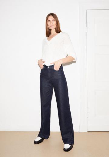 Клешеные джинсы