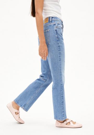 Клешеные джинсы