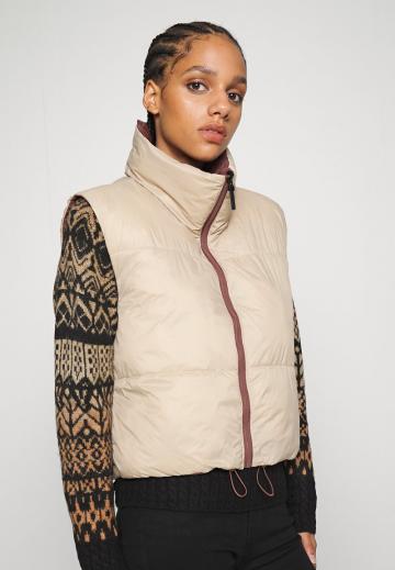 Стеганый жилет