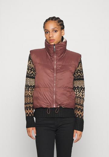 Стеганый жилет