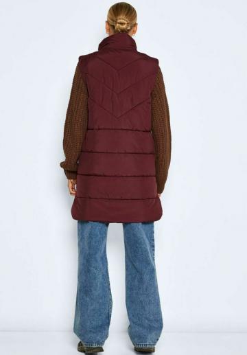 Длинный жилет