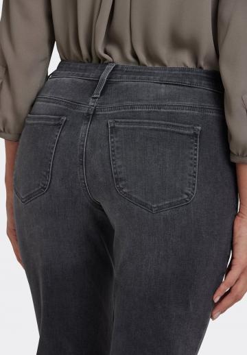 Клешеные джинсы