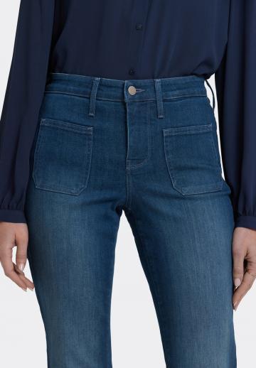 Клешеные джинсы