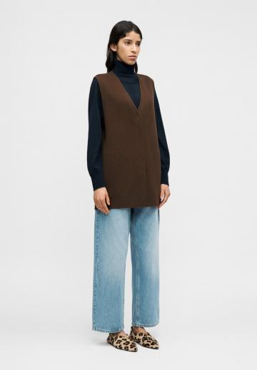 Длинный жилет