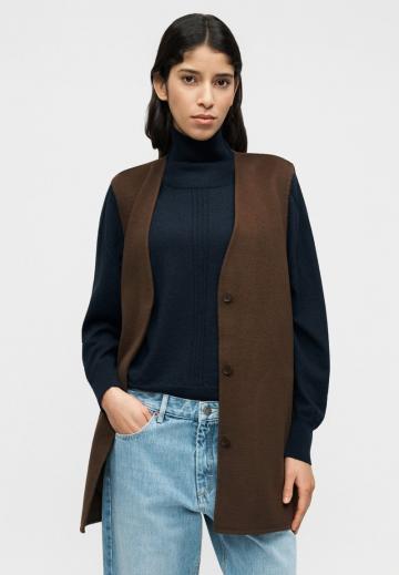 Длинный жилет