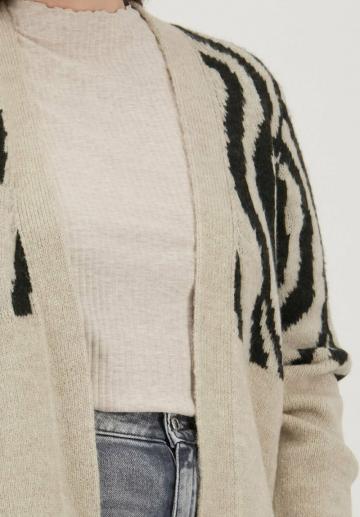 Длинный жилет