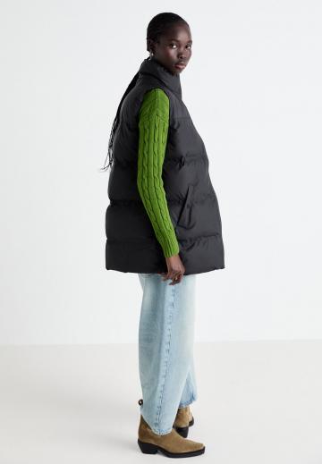 Длинный жилет