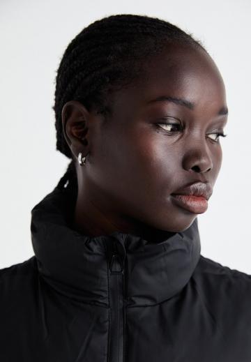 Длинный жилет