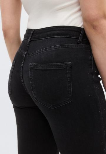 Клешеные джинсы