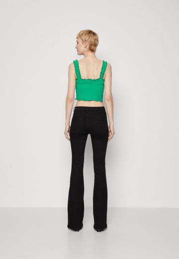 Клешеные джинсы