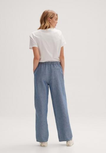 Клешеные джинсы