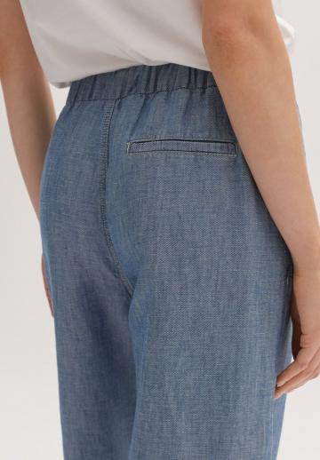 Клешеные джинсы