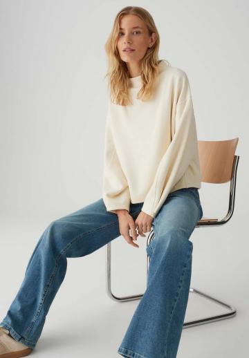 Клешеные джинсы