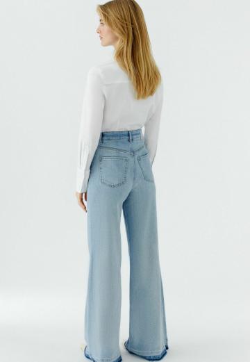 Клешеные джинсы