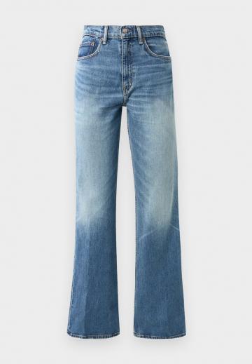 Клешеные джинсы