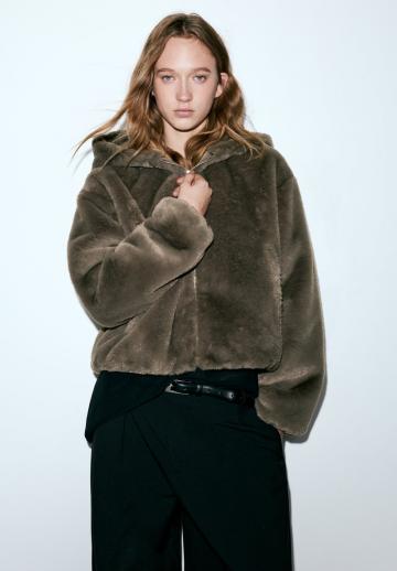 Пуховой жилет