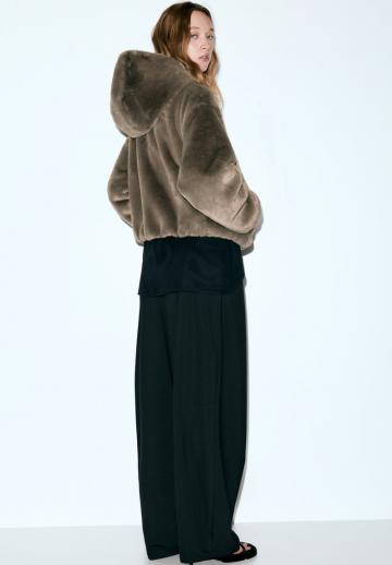 Пуховой жилет