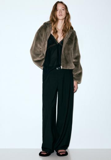 Пуховой жилет