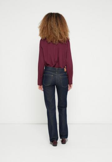 Клешеные джинсы