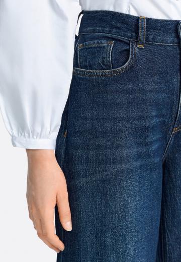 Клешеные джинсы