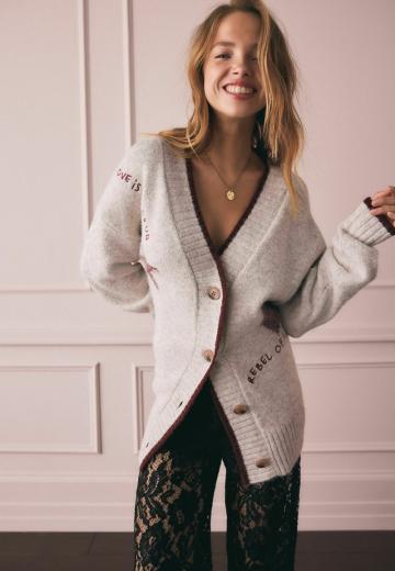 Длинный жилет