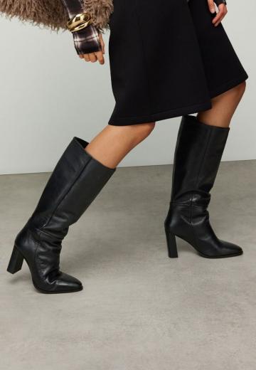 Высокие сапоги