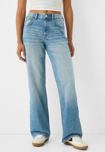 Клешеные джинсы