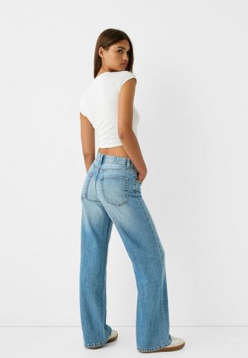 Клешеные джинсы