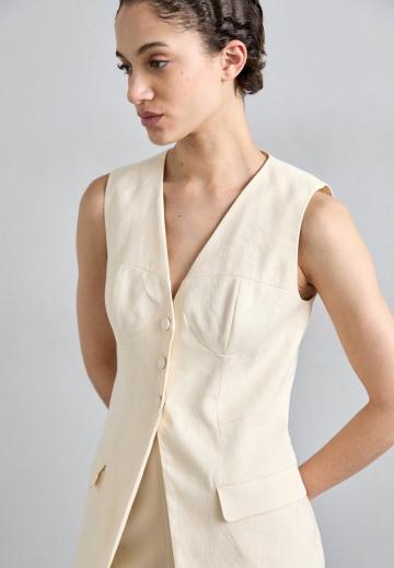 Длинный жилет