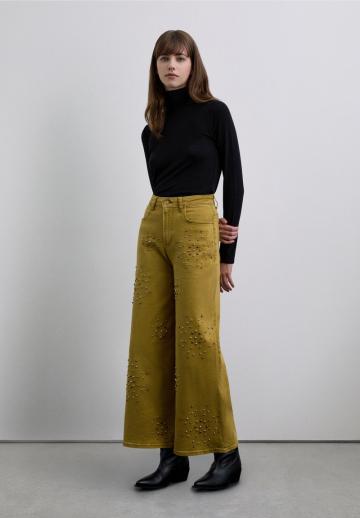 Клешеные джинсы