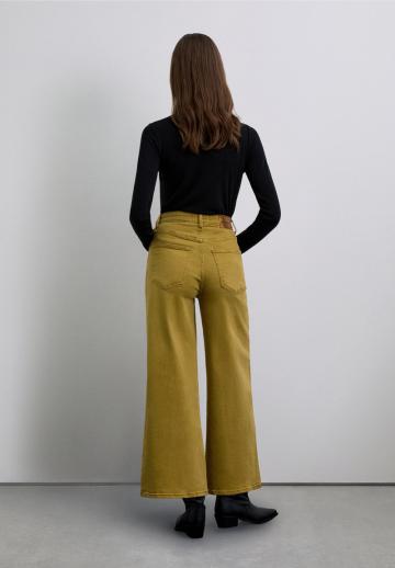 Клешеные джинсы