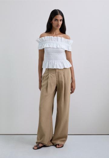 Блузка без рукавов