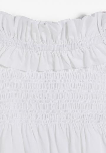 Блузка без рукавов