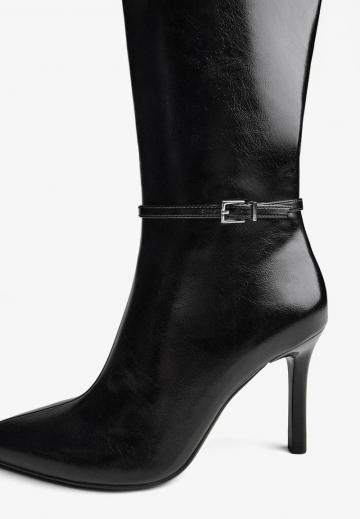 Высокие сапоги