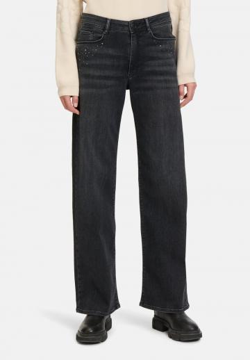 Клешеные джинсы