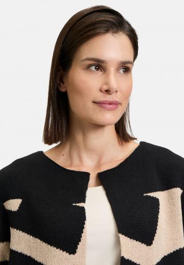 Длинный жилет