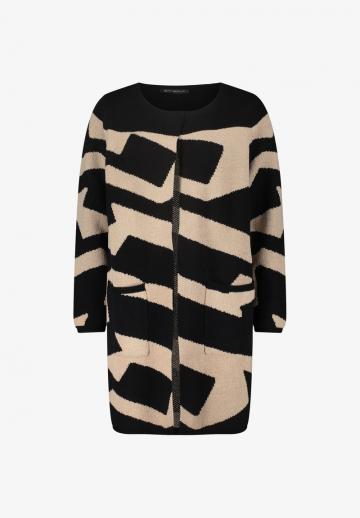 Длинный жилет