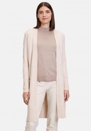 Длинный жилет