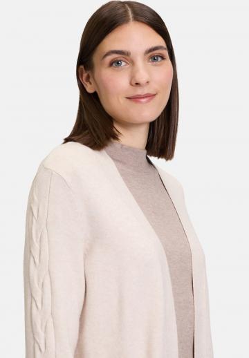 Длинный жилет