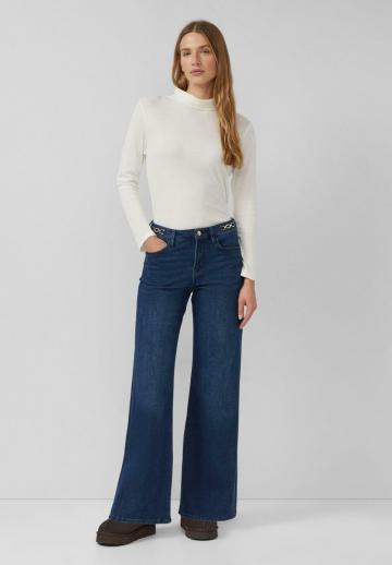 Клешеные джинсы