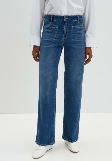 Клешеные джинсы
