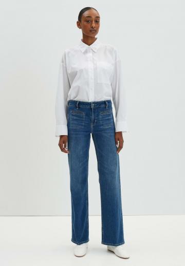 Клешеные джинсы