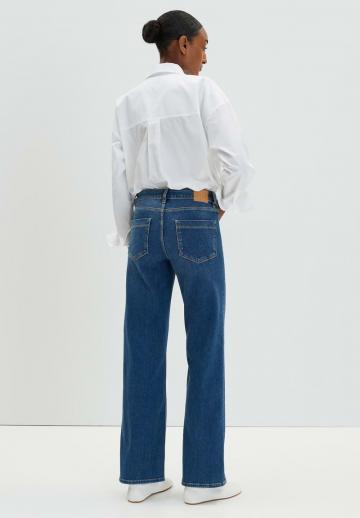 Клешеные джинсы