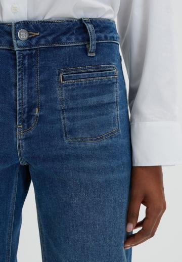 Клешеные джинсы